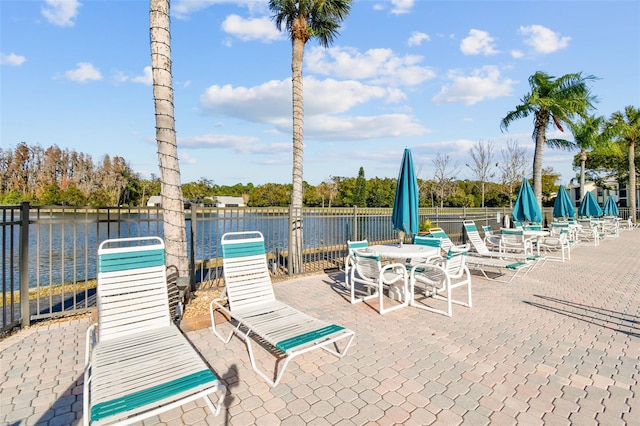 view of patio / terrace featuring a water view