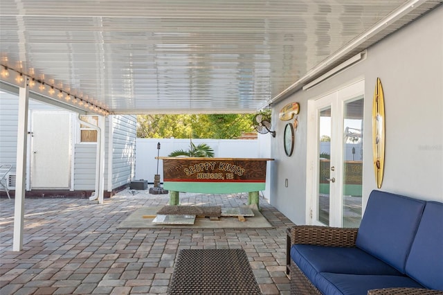 view of patio featuring french doors