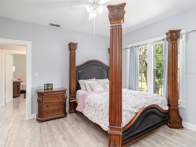 bedroom featuring ceiling fan and light wood-type flooring