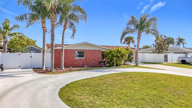 view of front of home with a front lawn