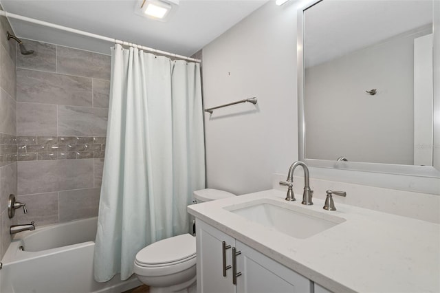 full bathroom with vanity, toilet, and shower / tub combo