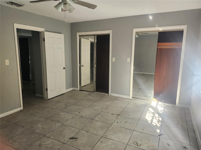 unfurnished bedroom with ceiling fan