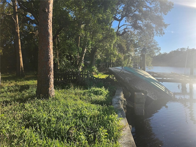 view of dock with a water view