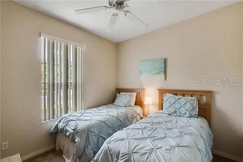 bedroom featuring ceiling fan