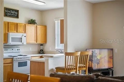 kitchen with white appliances