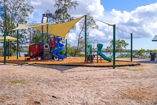 view of play area with a water view