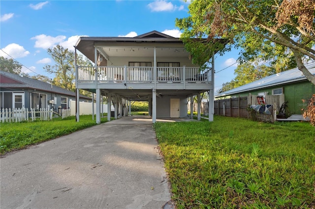 1244 31st Ave E, Bradenton, FL 34208 - view of front of house with a carport and driveway
