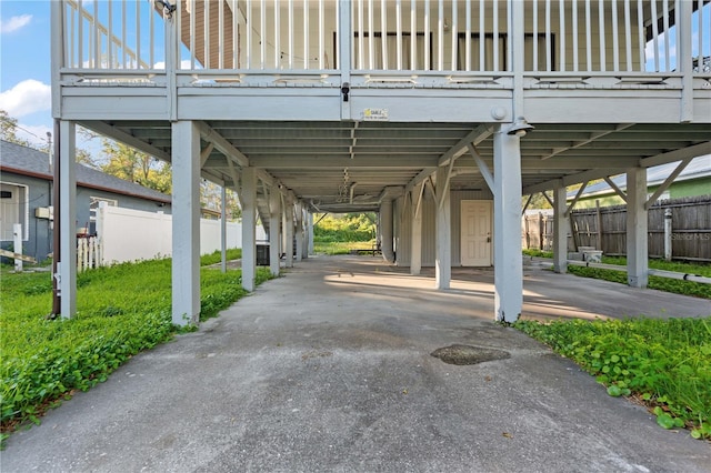 view of parking with a carport