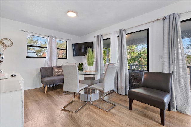 dining room featuring light hardwood / wood-style floors