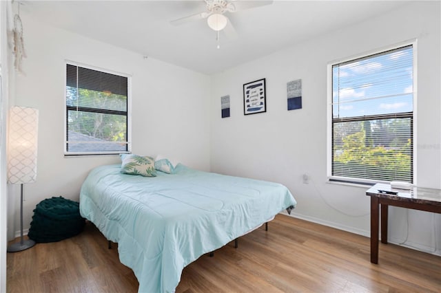 bedroom featuring ceiling fan and wood-type flooring