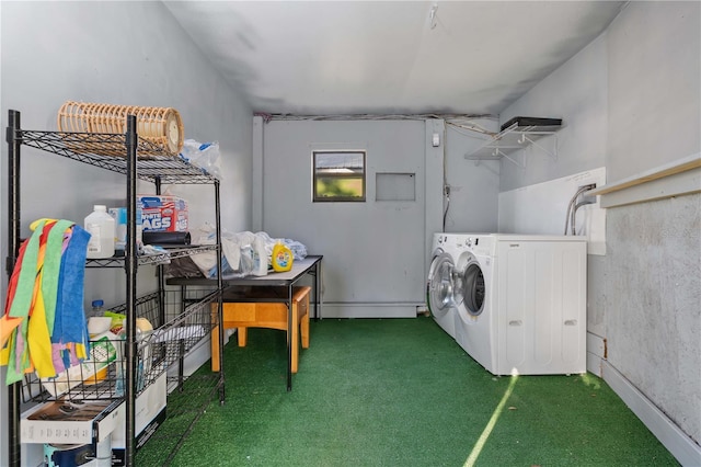 washroom with dark colored carpet and washing machine and clothes dryer