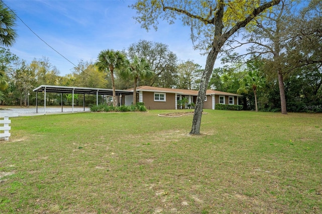 view of yard featuring a carport