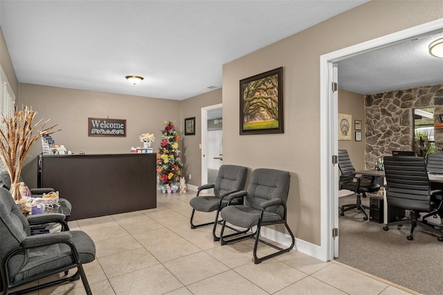 sitting room featuring light tile patterned floors