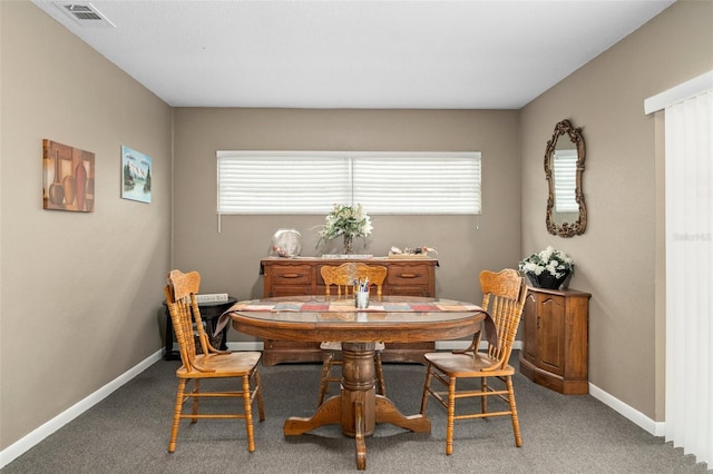 dining room featuring carpet floors