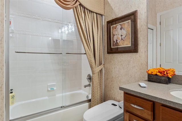 full bathroom with shower / tub combo with curtain, vanity, and toilet