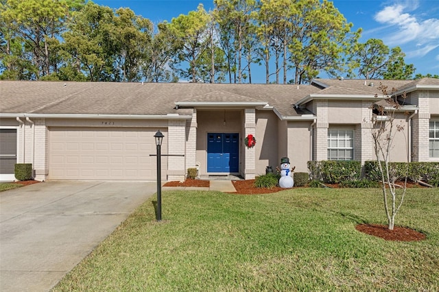 ranch-style house with a front yard and a garage