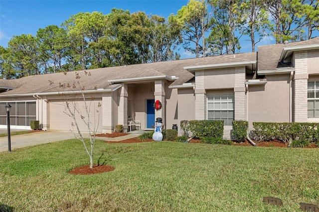 ranch-style home with a front yard and a garage