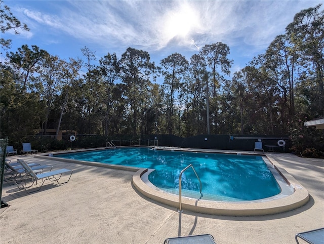 view of pool with a patio area