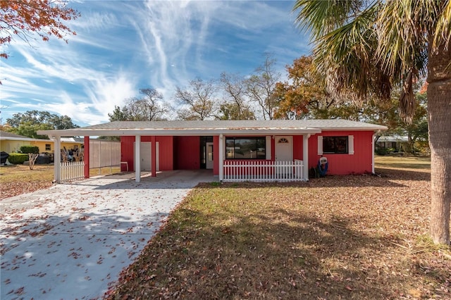 single story home with a carport