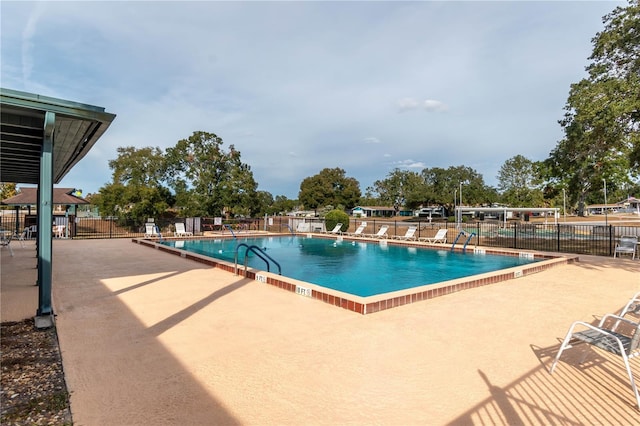 view of pool featuring a patio area