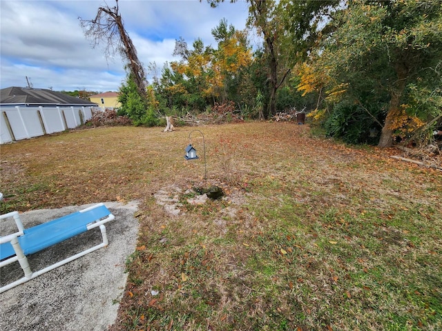 view of yard with fence