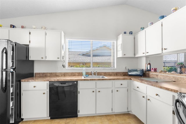 kitchen featuring white cabinets, sink, vaulted ceiling, and black appliances