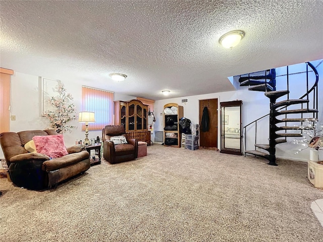 carpeted living room featuring a textured ceiling