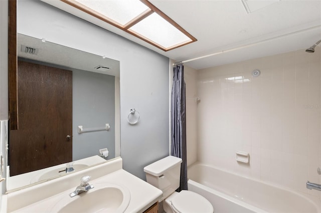 full bathroom with shower / bathtub combination with curtain, vanity, and toilet