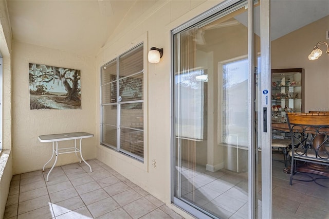 sunroom / solarium with lofted ceiling