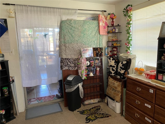 interior space with light tile patterned floors