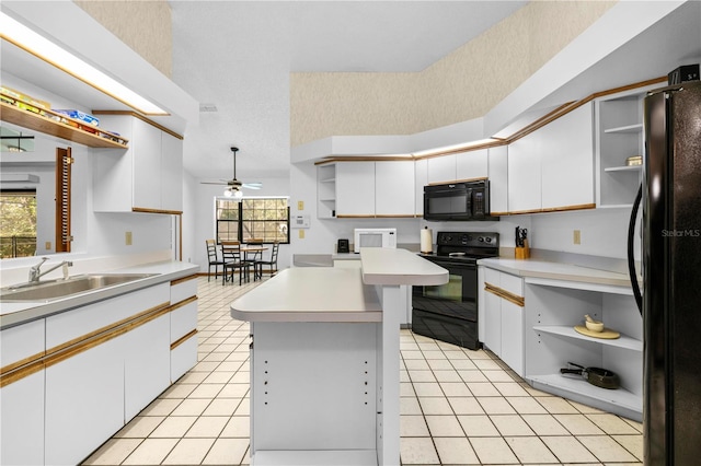 kitchen featuring ceiling fan, sink, black appliances, light tile patterned floors, and white cabinets