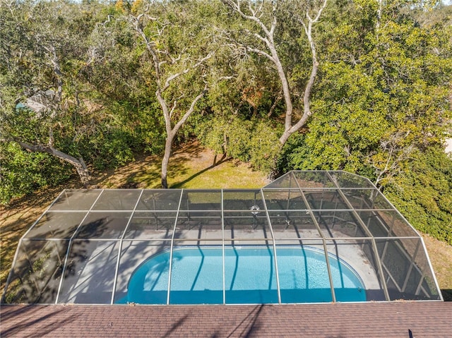 7443 Oak Tree Ln, Spring Hill, FL 34607 - view of swimming pool featuring a lanai and a patio area