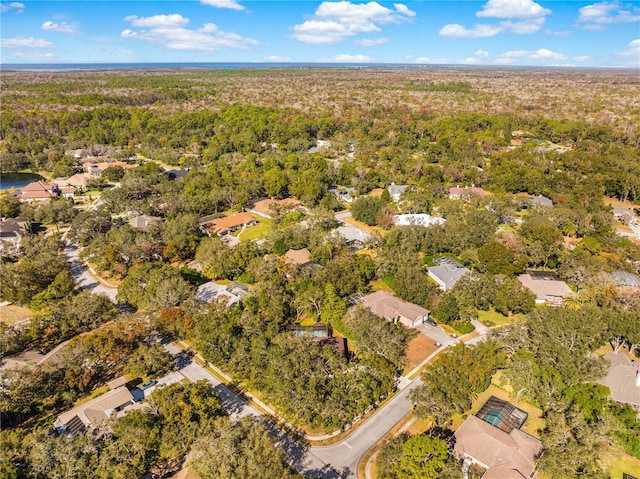 7443 Oak Tree Ln, Spring Hill, FL 34607 - aerial overview of property's location with nearby suburban area