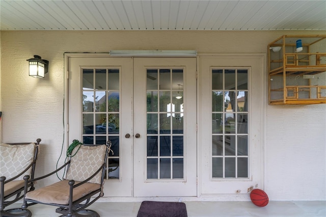 doorway to property featuring french doors