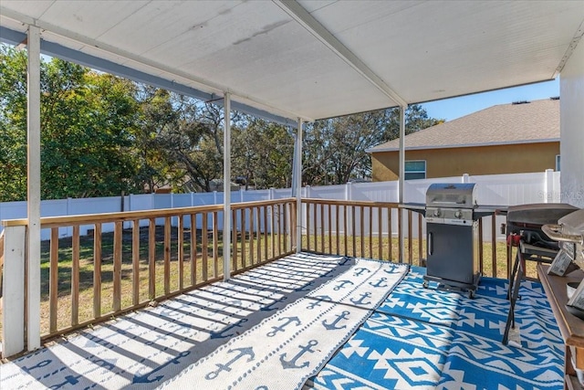 wooden terrace with area for grilling