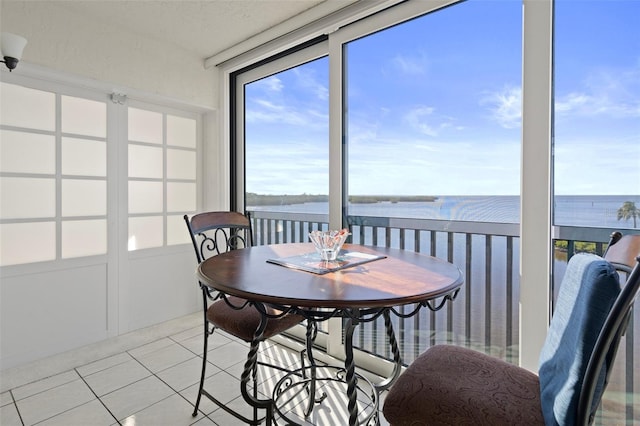 sunroom with a water view