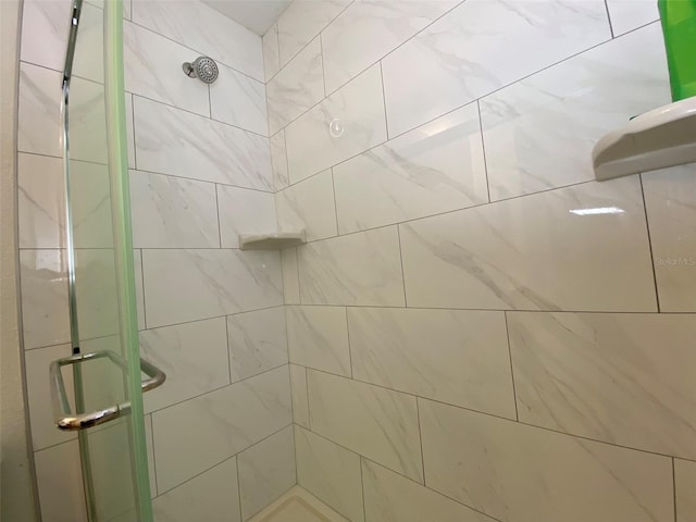 bathroom with an enclosed shower