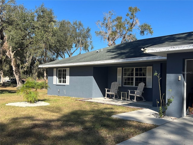 exterior space with a front lawn