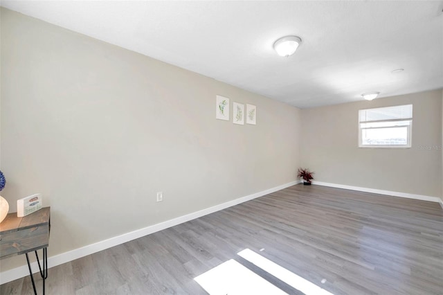 basement with wood-type flooring