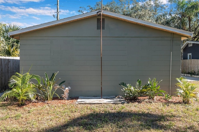 garage with a yard