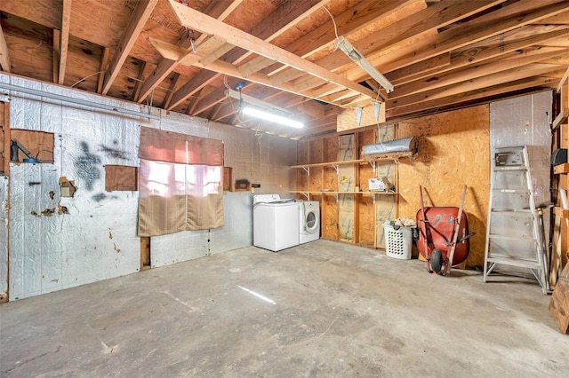 basement featuring washing machine and dryer