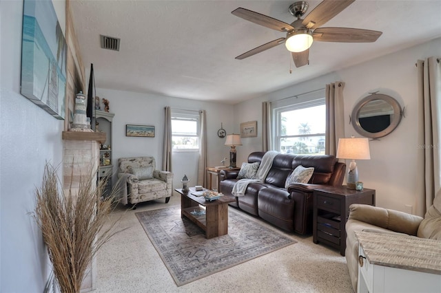 living room with ceiling fan