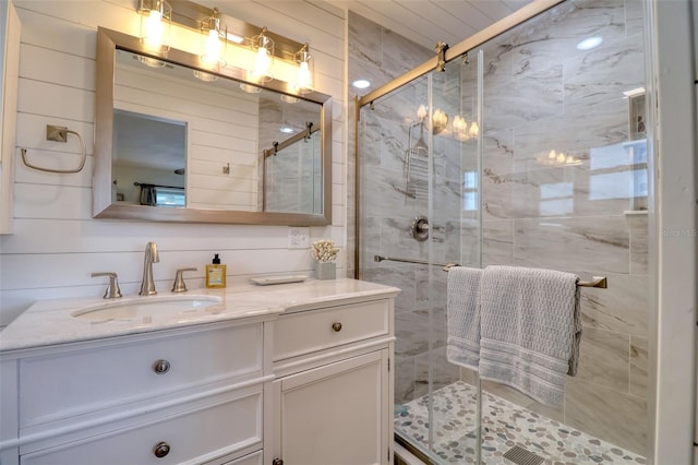 bathroom featuring vanity and walk in shower