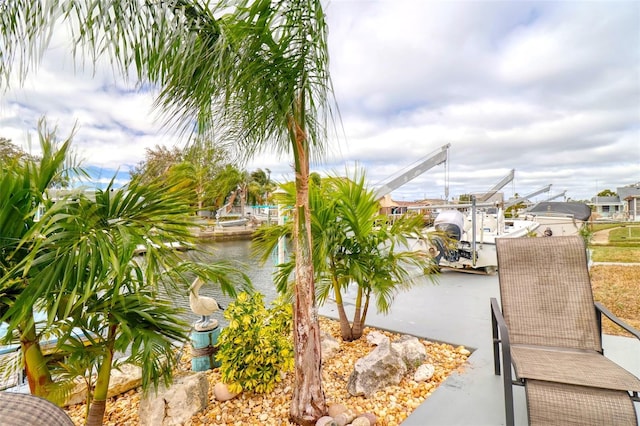 property view of water featuring a dock