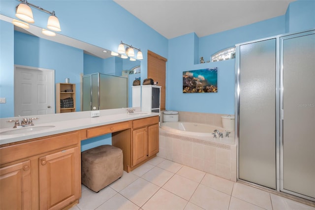 11645 Belle Haven Dr, New Port Richey, FL 34654 - full bath with a stall shower, double vanity, a bath, and tile patterned floors