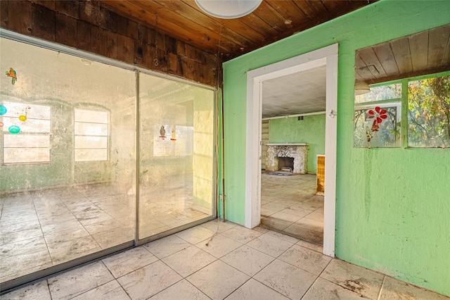 interior space featuring wooden ceiling