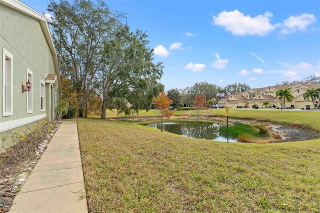 view of yard with a water view