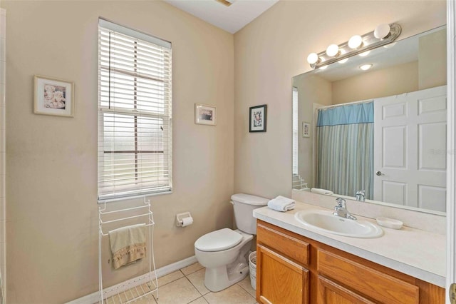 bathroom featuring a shower with curtain, tile patterned flooring, vanity, and toilet