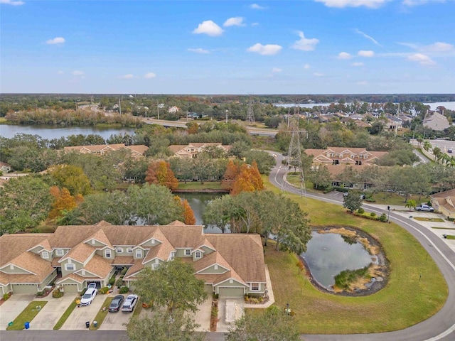 drone / aerial view with a water view