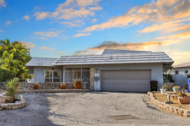 ranch-style house with a garage